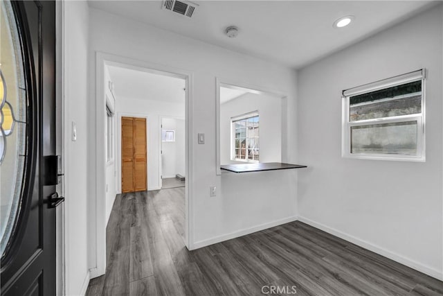 210 Amabel St, Los Angeles, CA 90065 - empty room featuring dark wood-style flooring, recessed lighting, and a smoke detector