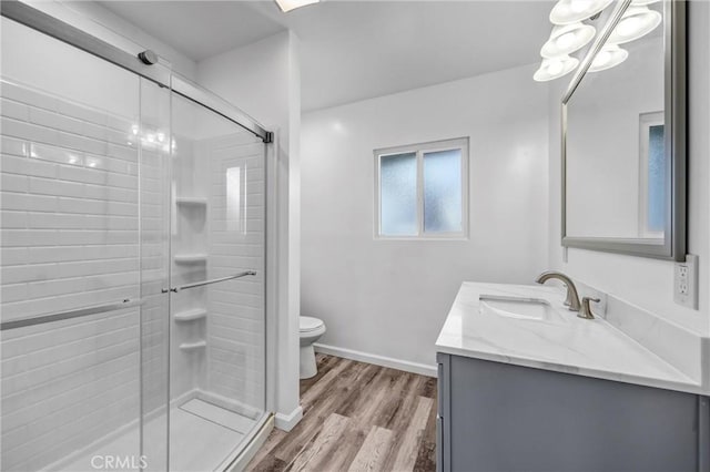 210 Amabel St, Los Angeles, CA 90065 - full bathroom featuring vanity, a shower stall, and wood finished floors