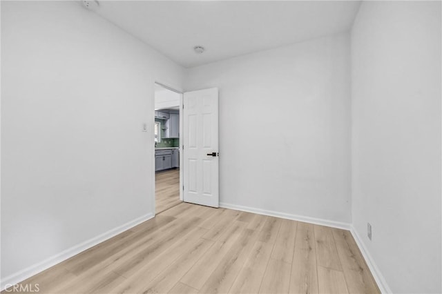 210 Amabel St, Los Angeles, CA 90065 - unfurnished room with light wood-type flooring and a smoke detector