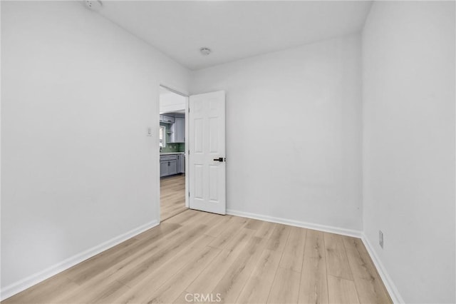 210 Amabel St, Los Angeles, CA 90065 - unfurnished room featuring light wood finished floors and a smoke detector
