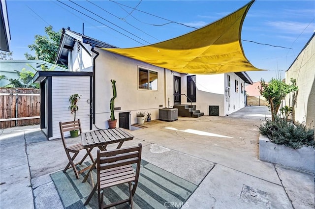 210 Amabel St, Los Angeles, CA 90065 - back of property with stucco siding and a patio area
