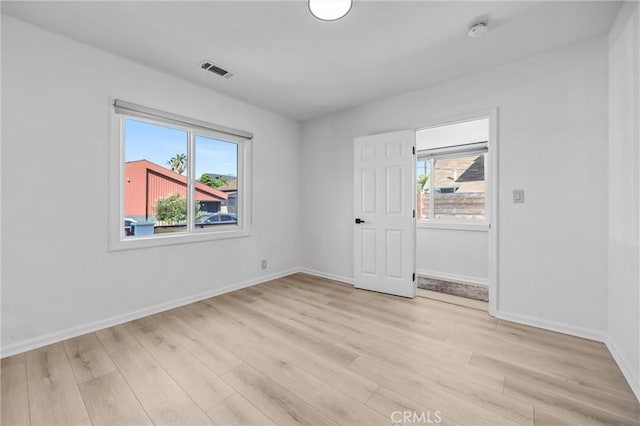210 Amabel St, Los Angeles, CA 90065 - spare room with a smoke detector and light wood-style floors