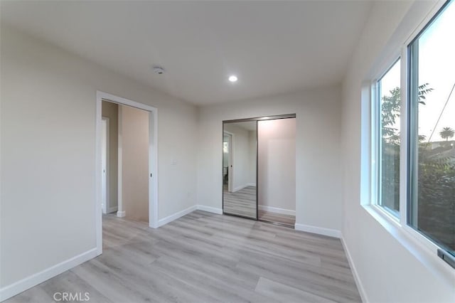 210 Amabel St, Los Angeles, CA 90065 - unfurnished bedroom with recessed lighting, light wood-style flooring, and a closet