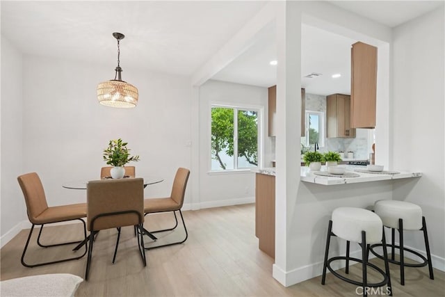 8115 Etiwanda Ave, Reseda, CA 91335 - dining room with light wood-style flooring, baseboards, and recessed lighting