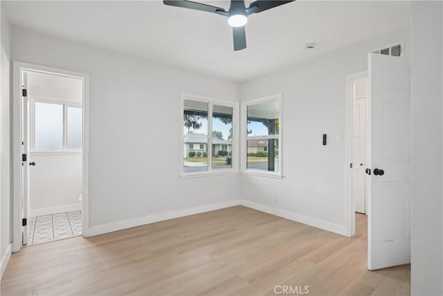 8115 Etiwanda Ave, Reseda, CA 91335 - spare room featuring ceiling fan, light wood finished floors, and baseboards