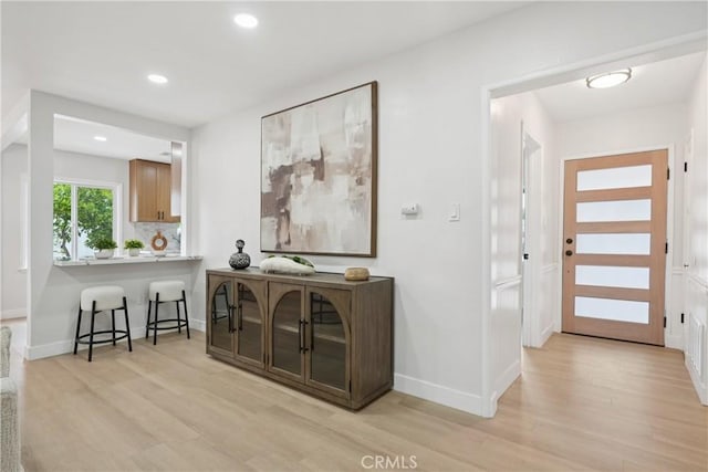 8115 Etiwanda Ave, Reseda, CA 91335 - entrance foyer with light wood-style flooring, baseboards, and recessed lighting