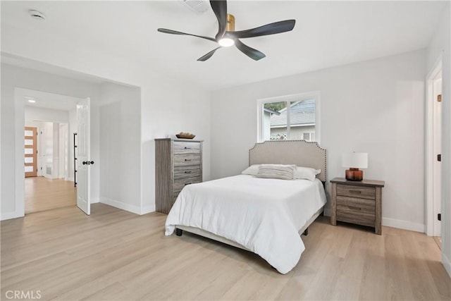 8115 Etiwanda Ave, Reseda, CA 91335 - bedroom with light wood finished floors, baseboards, and a ceiling fan