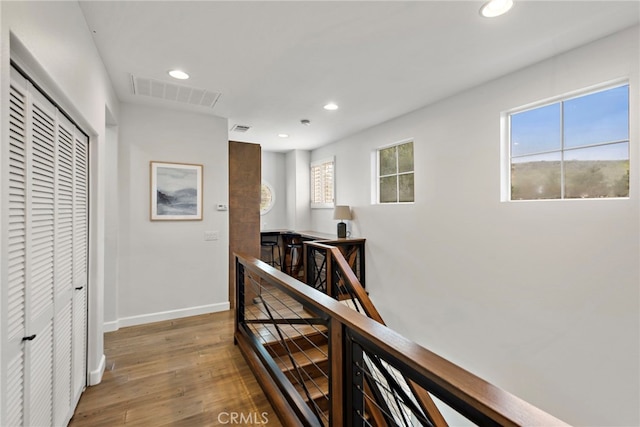 9 Reese Crk, Ladera Ranch, CA 92694 - hall with an upstairs landing, recessed lighting, wood finished floors, plenty of natural light, and baseboards