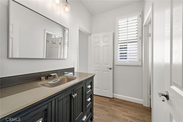 9 Reese Crk, Ladera Ranch, CA 92694 - bathroom featuring vanity, wood finished floors, and baseboards