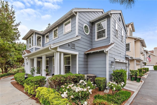 9 Reese Crk, Ladera Ranch, CA 92694 - view of front of home featuring an attached garage and central AC unit