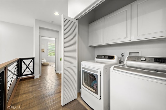 9 Reese Crk, Ladera Ranch, CA 92694 - washroom with washer and dryer, cabinet space, wood-type flooring, recessed lighting, and baseboards