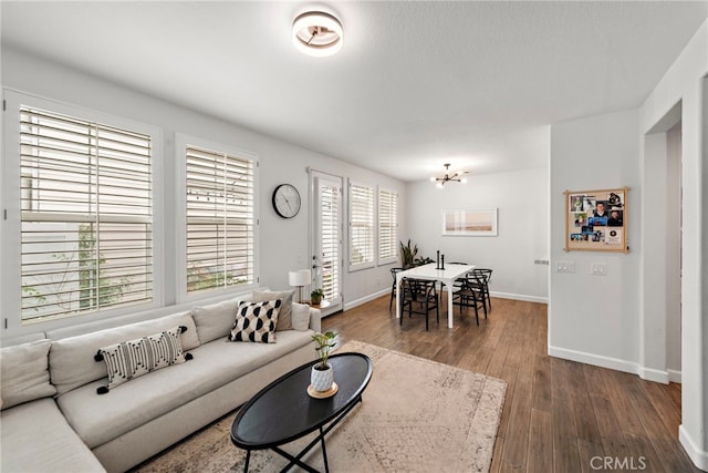 9 Reese Crk, Ladera Ranch, CA 92694 - living area featuring baseboards and dark wood finished floors