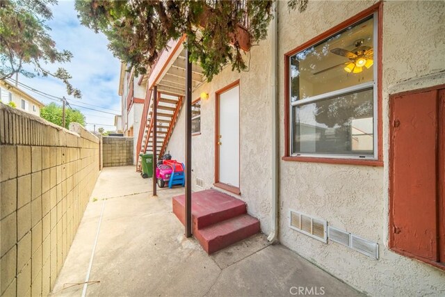 823 W 25th St, San Pedro, CA 90731 - fenced backyard featuring stairway and a patio area