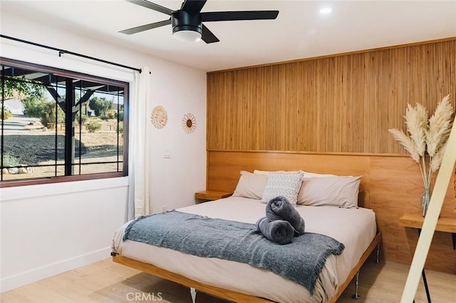 58250 Sierra Vista Dr, Yucca Valley, CA 92284 - bedroom with wood finished floors, ceiling fan, and baseboards