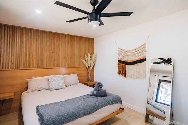 58250 Sierra Vista Dr, Yucca Valley, CA 92284 - bedroom with wood finished floors, baseboards, and a ceiling fan