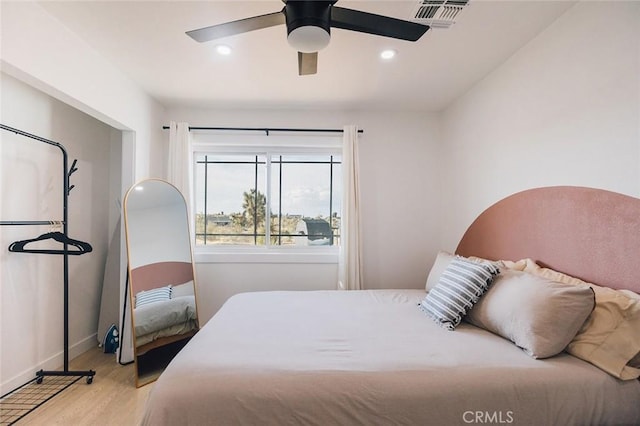58250 Sierra Vista Dr, Yucca Valley, CA 92284 - bedroom with wood finished floors, baseboards, ceiling fan, and recessed lighting