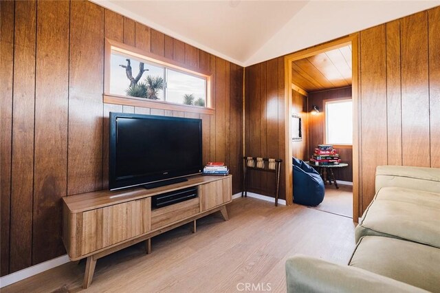 58250 Sierra Vista Dr, Yucca Valley, CA 92284 - living room with light wood-style floors, wooden walls, and lofted ceiling