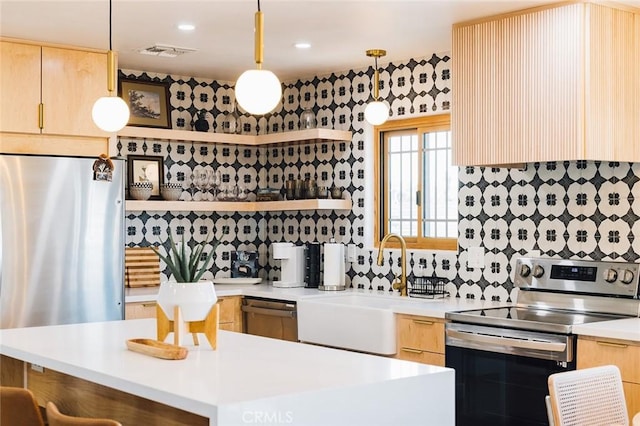 58250 Sierra Vista Dr, Yucca Valley, CA 92284 - kitchen with appliances with stainless steel finishes, open shelves, light brown cabinets, tasteful backsplash, and light countertops