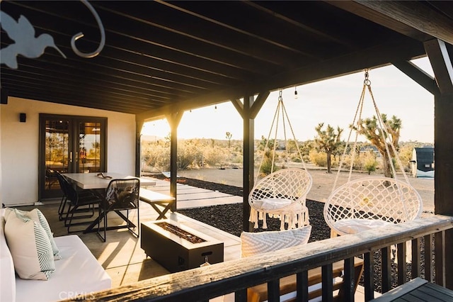 58250 Sierra Vista Dr, Yucca Valley, CA 92284 - deck featuring a fire pit, a patio, and outdoor dining space