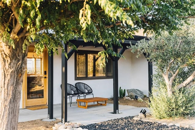 58250 Sierra Vista Dr, Yucca Valley, CA 92284 - doorway to property with stucco siding