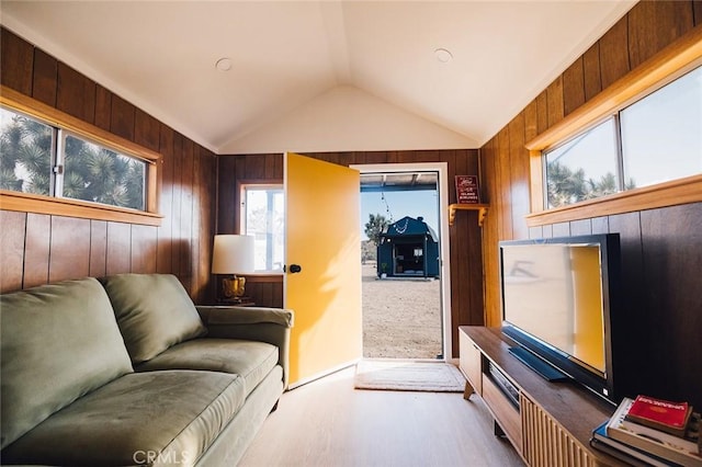 58250 Sierra Vista Dr, Yucca Valley, CA 92284 - living area with lofted ceiling, wood finished floors, and wooden walls