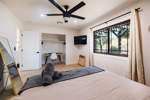 58250 Sierra Vista Dr, Yucca Valley, CA 92284 - bedroom with wood finished floors, recessed lighting, a closet, and ceiling fan