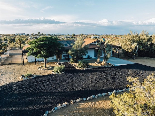 58250 Sierra Vista Dr, Yucca Valley, CA 92284 - view of front of property featuring roof mounted solar panels