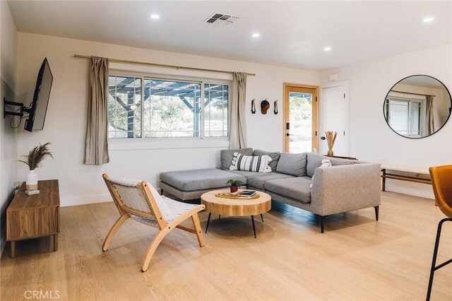 58250 Sierra Vista Dr, Yucca Valley, CA 92284 - living room featuring light wood-style flooring, recessed lighting, and baseboards