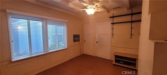 1623 S Sycamore Ave, Los Angeles, CA 90019 - unfurnished bedroom featuring a wood ceiling with exposed beams and carpet
