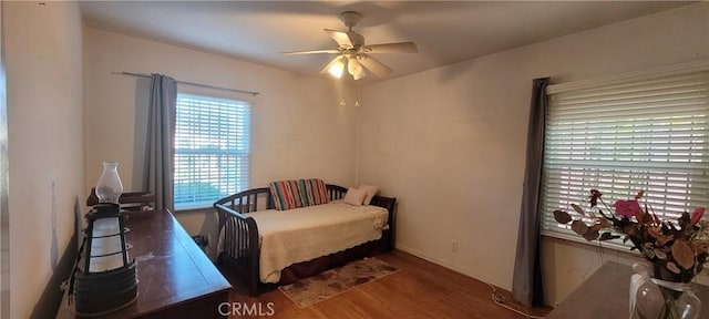 1623 S Sycamore Ave, Los Angeles, CA 90019 - bedroom with wood finished floors and ceiling fan