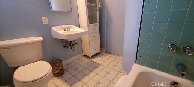 1623 S Sycamore Ave, Los Angeles, CA 90019 - bathroom with toilet and tile patterned floors