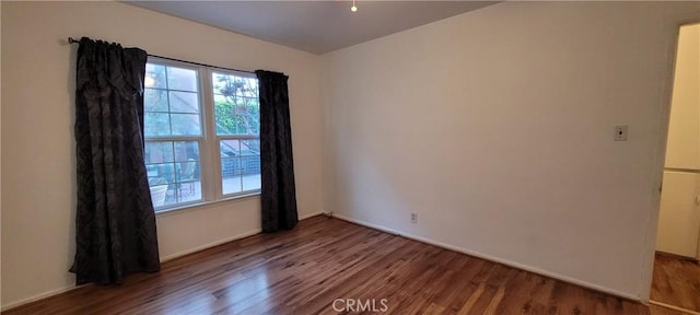 1623 S Sycamore Ave, Los Angeles, CA 90019 - empty room featuring wood finished floors