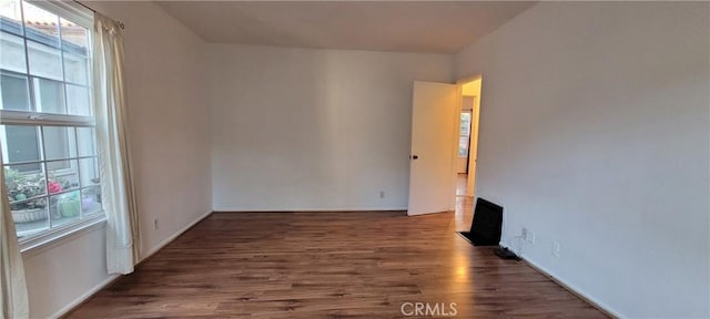 1623 S Sycamore Ave, Los Angeles, CA 90019 - spare room with wood finished floors