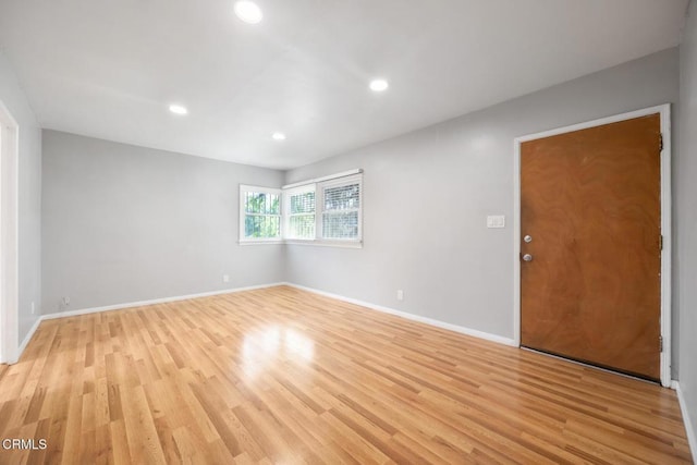  - unfurnished room with light wood-style flooring and recessed lighting