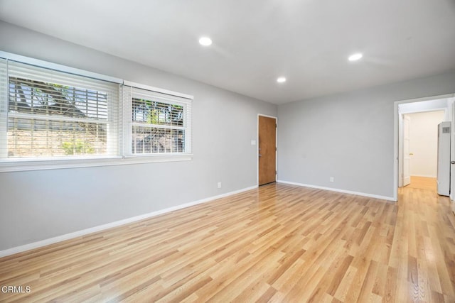  - spare room with light wood finished floors and recessed lighting