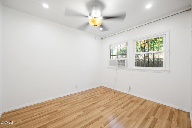  - unfurnished room with light wood-style flooring, recessed lighting, cooling unit, and ceiling fan