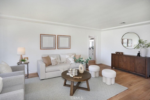 9864 Van Ruiten St, Bellflower, CA 90706 - living room with wood finished floors and baseboards