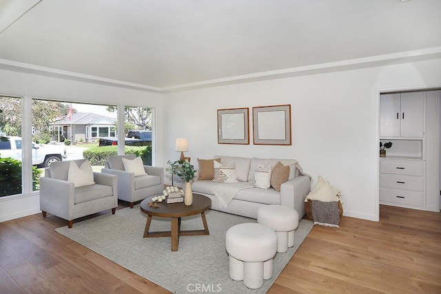 9864 Van Ruiten St, Bellflower, CA 90706 - living room with wood finished floors and baseboards