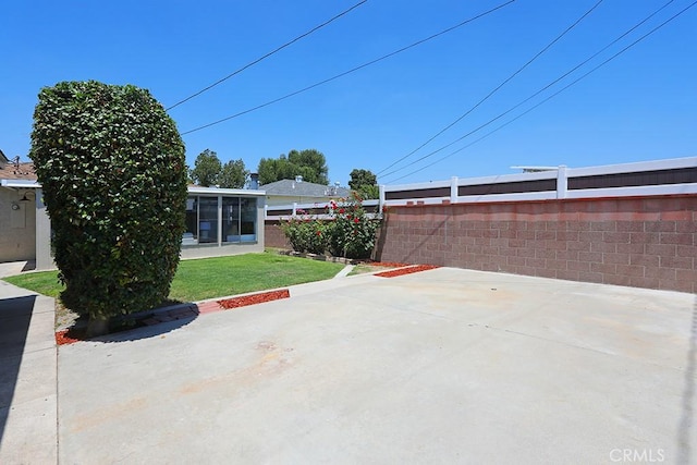 9864 Van Ruiten St, Bellflower, CA 90706 - view of patio / terrace featuring a sunroom