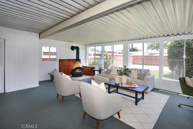 9864 Van Ruiten St, Bellflower, CA 90706 - sunroom / solarium featuring a wood stove and carpet floors