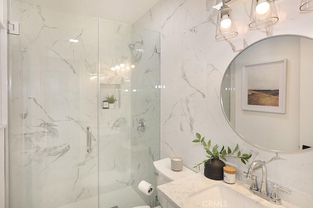 9864 Van Ruiten St, Bellflower, CA 90706 - bathroom with a marble finish shower, vanity, and tile walls