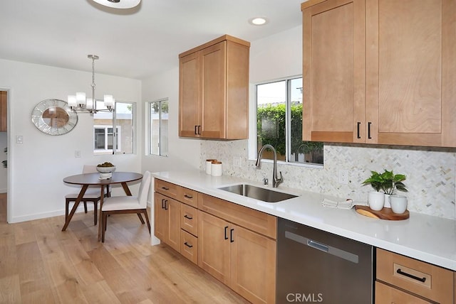 9864 Van Ruiten St, Bellflower, CA 90706 - kitchen with dishwasher, light wood-style flooring, decorative backsplash, light countertops, and recessed lighting
