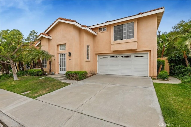 28462 La Alcala, Laguna Niguel, CA 92677 - view of front facade with a garage, stucco siding, concrete driveway, a front lawn, and a tile roof
