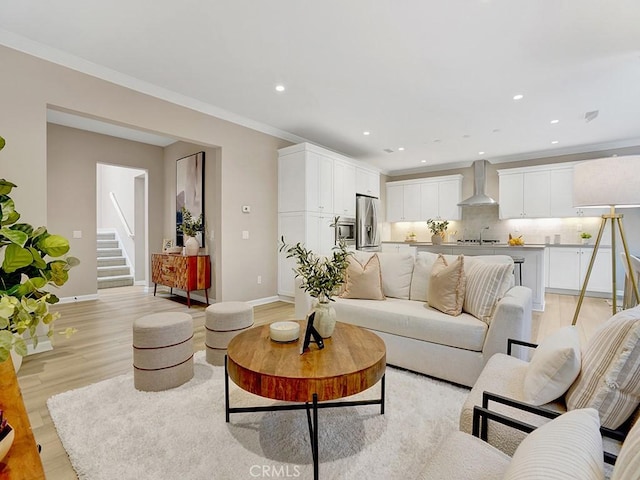 159 Frazier, Irvine, CA 92620 - living room featuring light wood finished floors, recessed lighting, stairs, and baseboards
