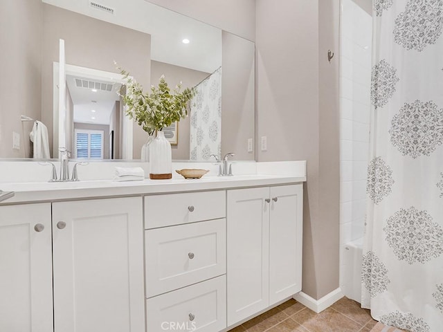 159 Frazier, Irvine, CA 92620 - full bath featuring double vanity, tile patterned floors, and shower / bathtub combination with curtain