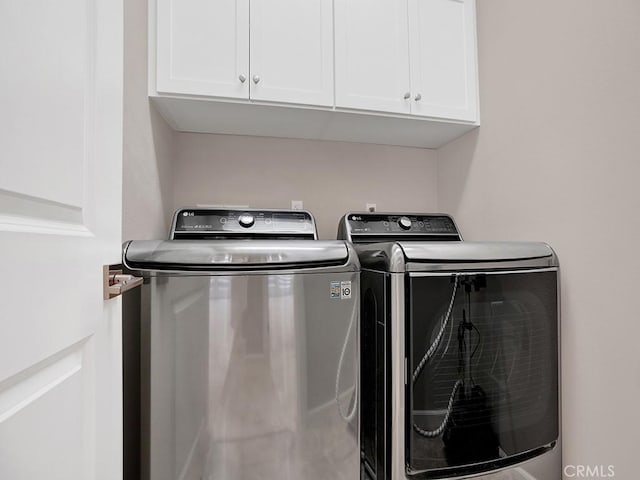 159 Frazier, Irvine, CA 92620 - washroom featuring washer and dryer and cabinet space