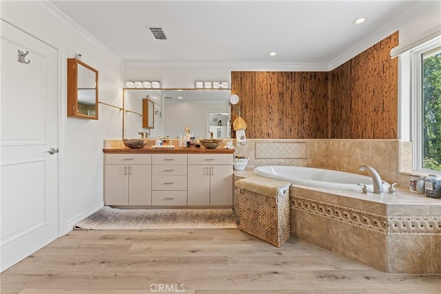 1377 Knoll Rd, Redlands, CA 92373 - bathroom with vanity, a garden tub, wood finished floors, crown molding, and recessed lighting