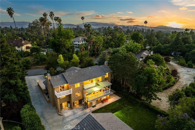 1377 Knoll Rd, Redlands, CA 92373 - aerial view at dusk of a mountain view and view of wooded area