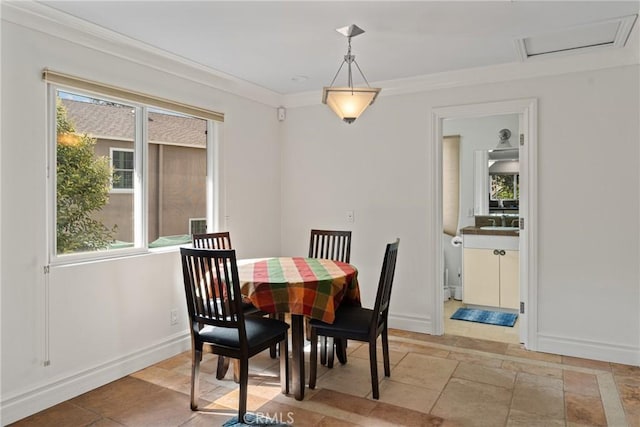 1377 Knoll Rd, Redlands, CA 92373 - dining space featuring healthy amount of natural light, stone tile flooring, and crown molding