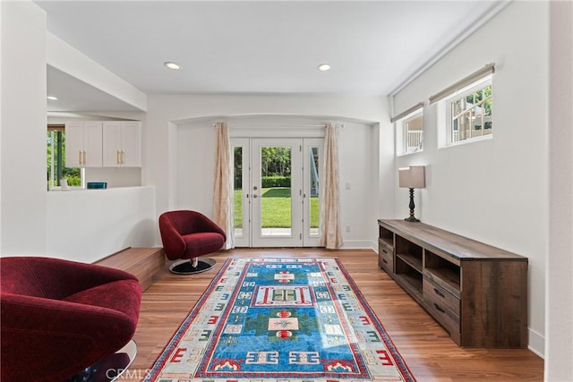 1377 Knoll Rd, Redlands, CA 92373 - living area with plenty of natural light, french doors, light wood-type flooring, and recessed lighting